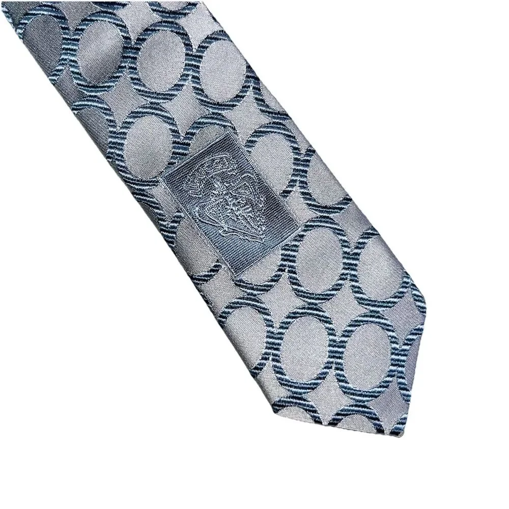 Gucci Italian Silk Tie Jacquard O’s Pattern All Over Print GG Interlocking  Logo